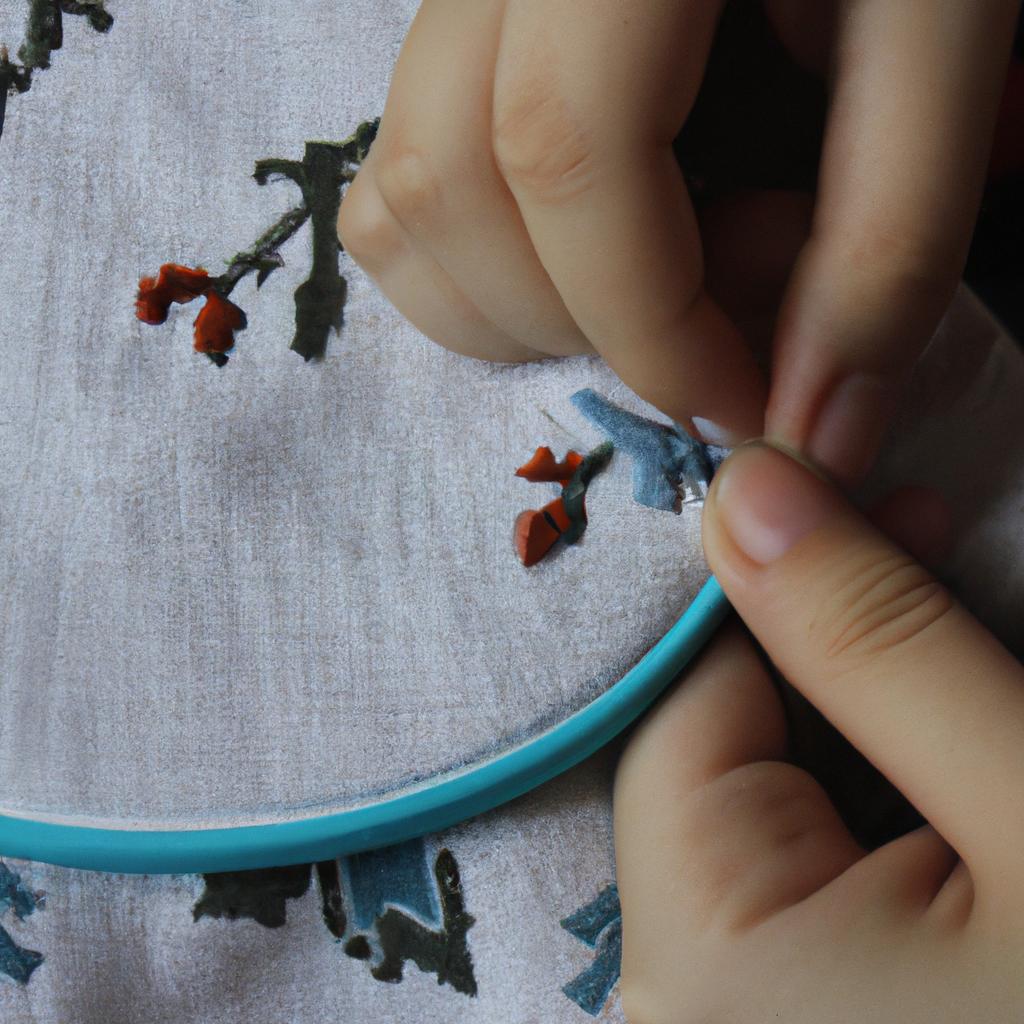 Person cross stitching with thread